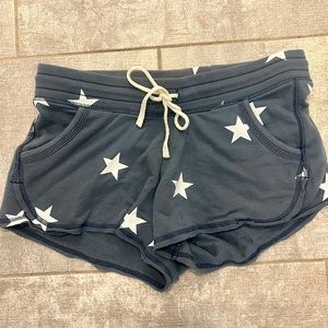 A pair of navy shorts with stars.